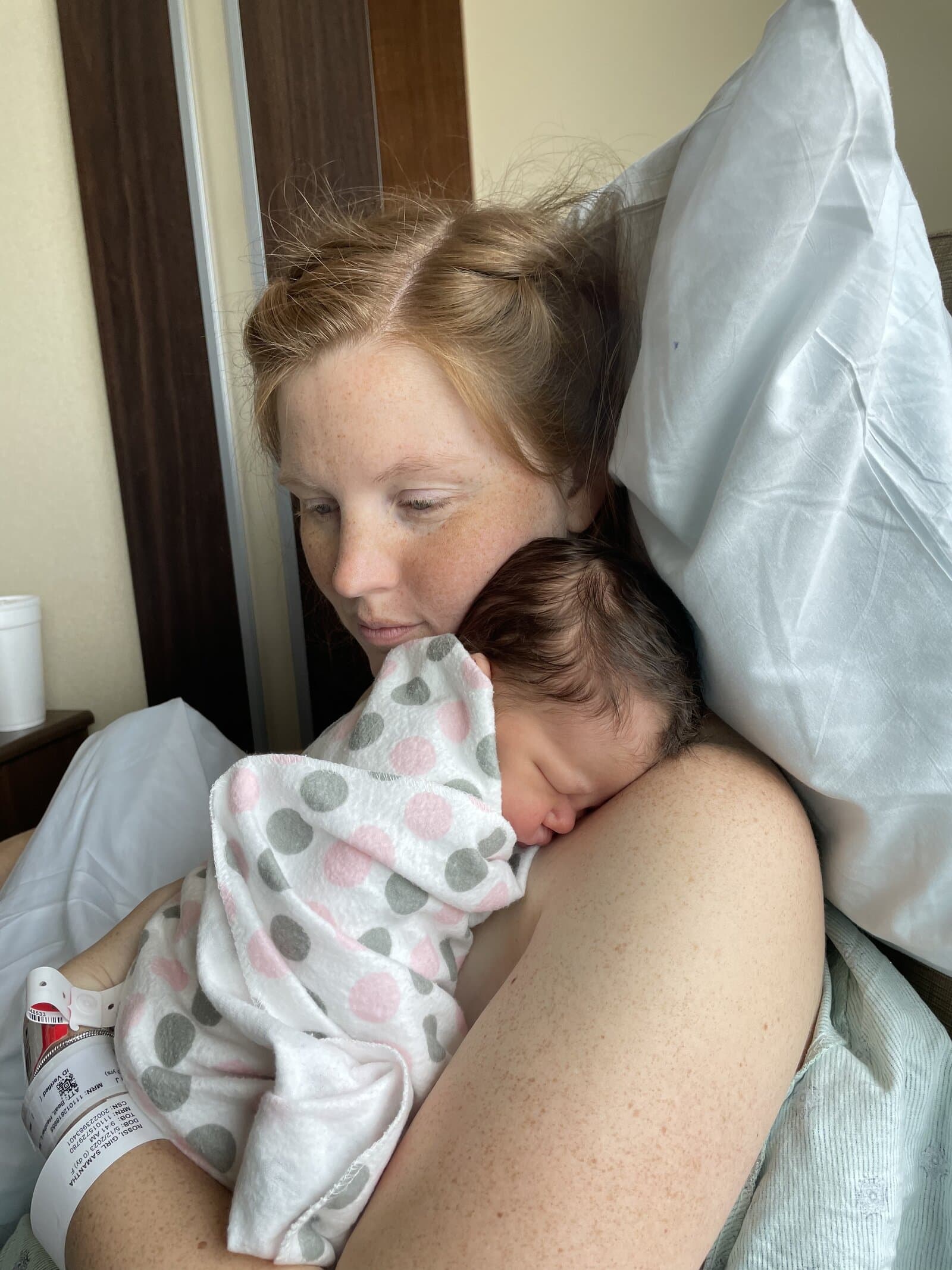 mom snuggling baby