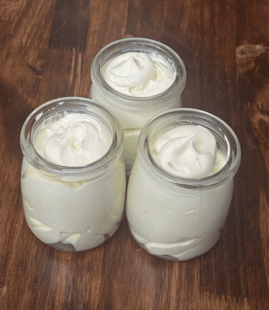 calendula tallow baby balm in glass jars