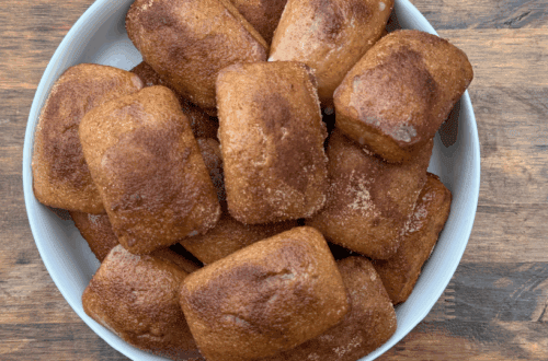 mini loaves of apple cider donut bread in a white bowl