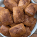 mini loaves of apple cider donut bread in a white bowl