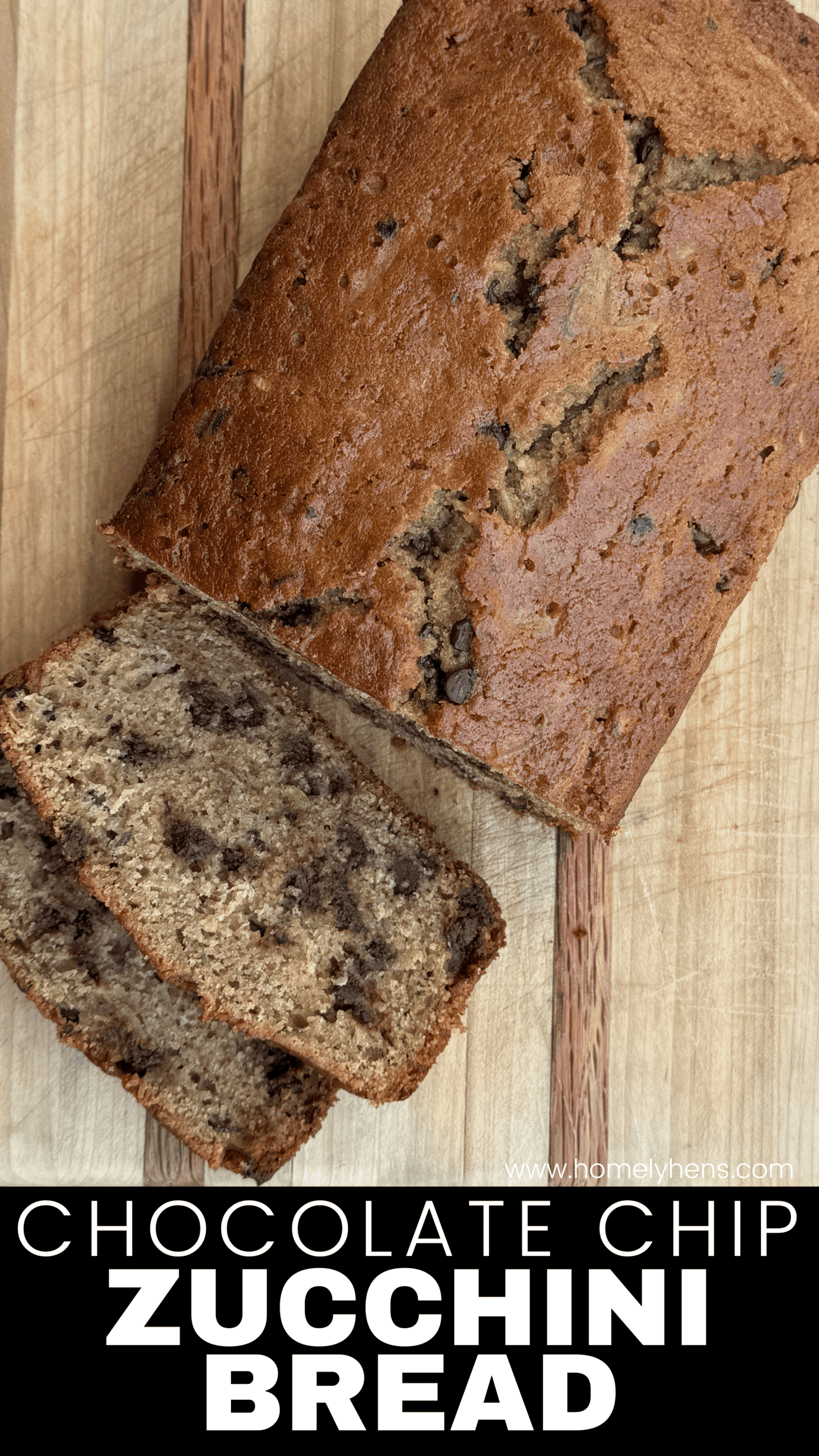loaf of chocolate chip zucchini bread on a handmade wooden cutting board