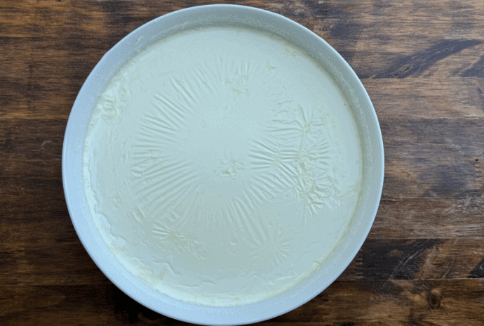 Homemade yogurt right after fermentation in glass bowl