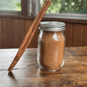 4 oz container of apple pie spice with a cinnamon stick
