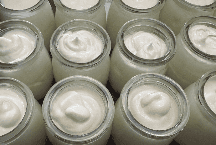 open jars with tallow and jojoba balm
