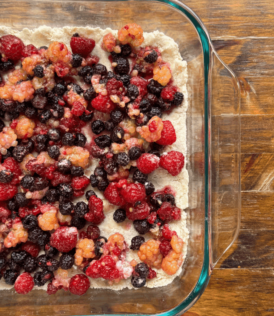 raspberry crumble with mixed gold, black, and red raspberries