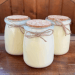 Three jars filled with tallow balm arranged together