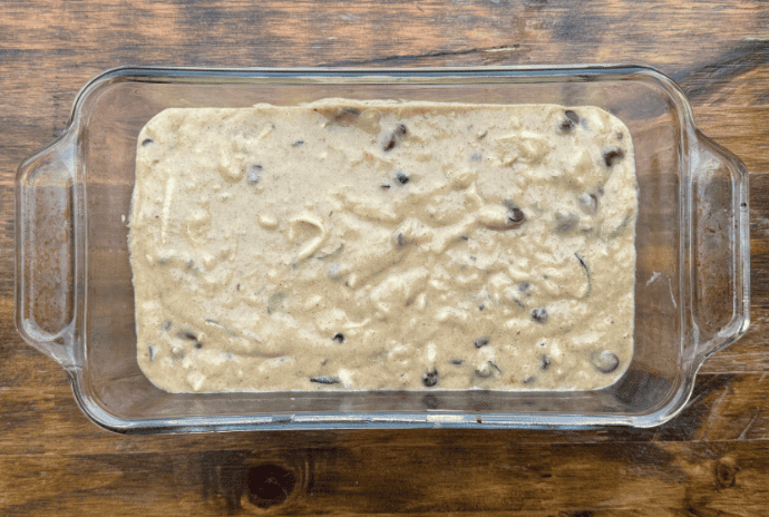uncooked chocolate chip zucchini batter in a loaf pan