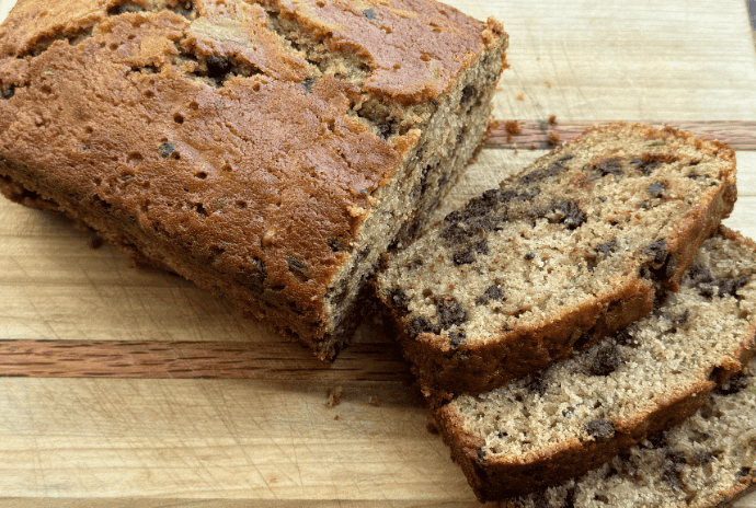 chocolate chip zucchini bread on a wooden cutting board