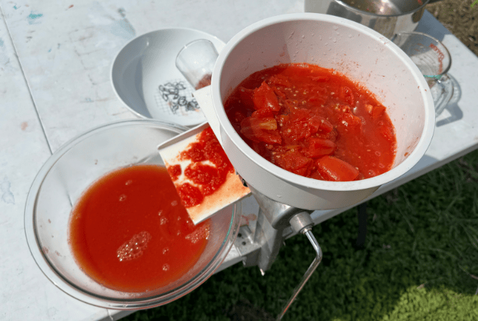 food mill processing tomatoes removing seeds, skins, and core