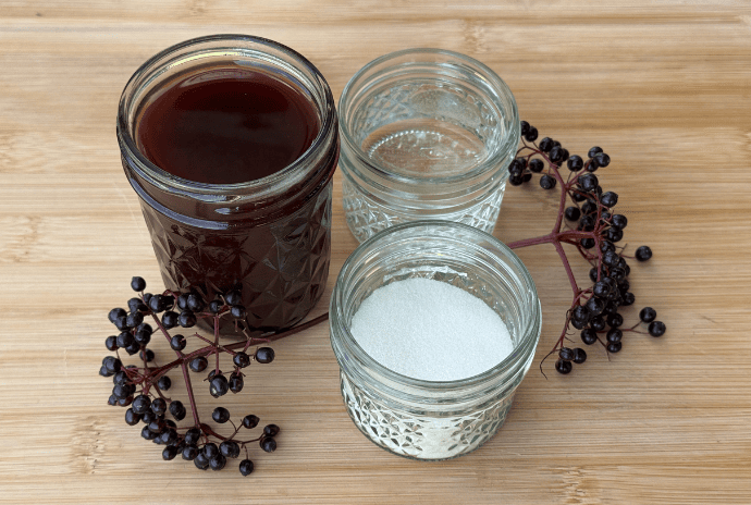 ingredients for elderberry gummies: elderberry syrup, water, and gelatin