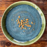 tomato seeds drying to save on a plate