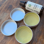 homemade herbal chest rub with eucalyptus in tins on a table