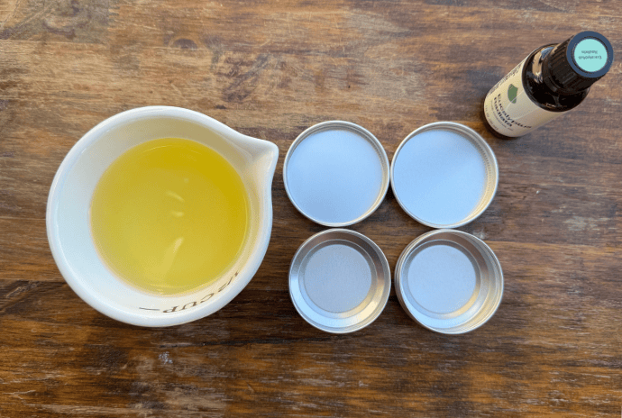 melted tallow chest rub with 1 oz tins and essential oil