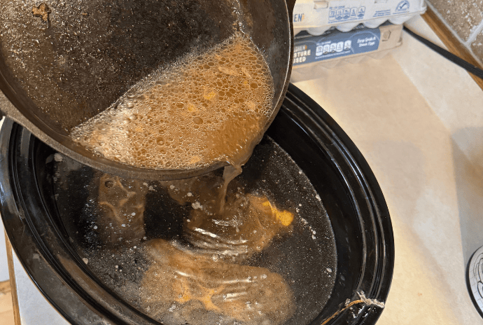 braising a cast iron pan to get beef drippings