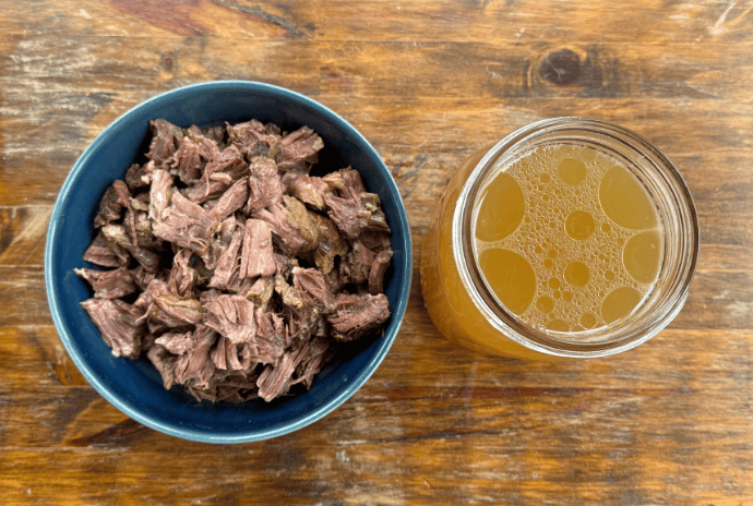 beef bone broth and tender meat off of soup bones